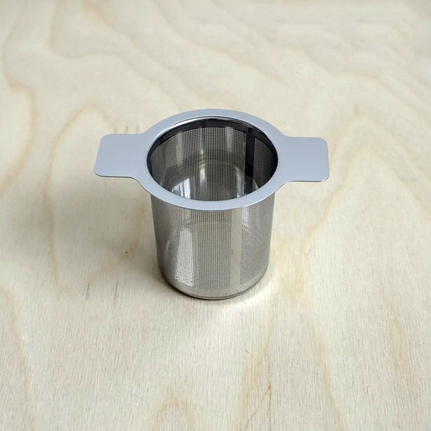 Vooraanzicht van een theefilter met zeef functie